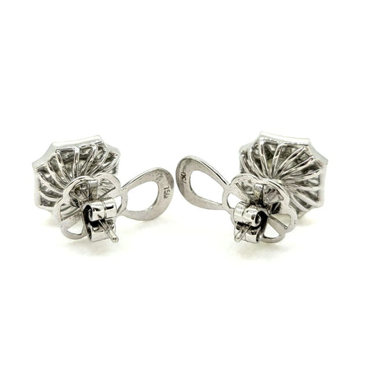 Brilliant and Baguette Cut Diamond Cluster Stud Earrings, 3.82 carat total, central 2.13cts round brilliant-cut diamonds encompassed within 1.69cts tapered baguette-cut diamond surround in 18ct white gold