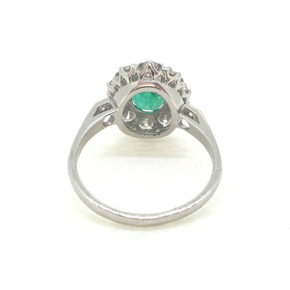 1.31ct Oval Emerald and Diamond Cluster Engagement Ring in Platinum