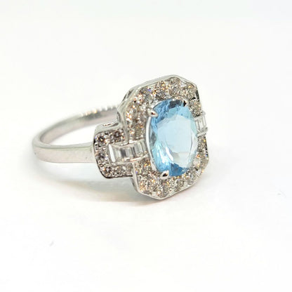 1.50ct Aquamarine and Diamond Cluster Engagement Ring