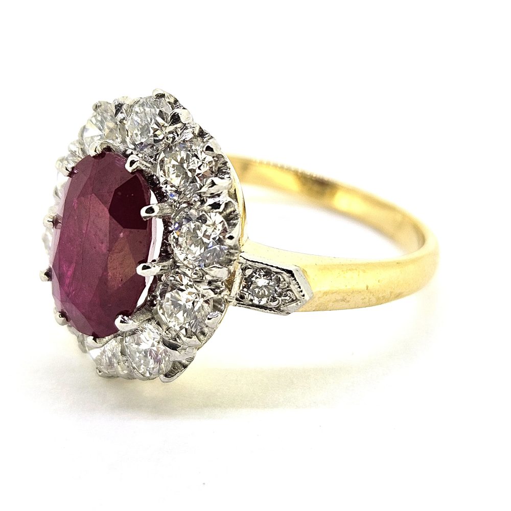 3.50ct Oval Ruby and Diamond Cluster Engagement Ring