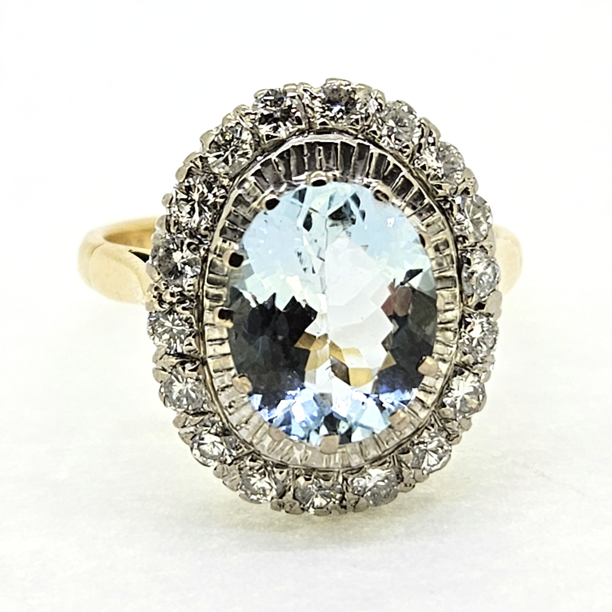 2.60ct Oval Aquamarine and Diamond Cluster Engagement Ring