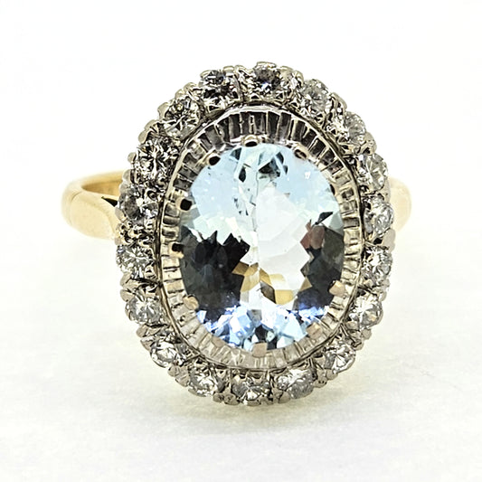 2.60ct Oval Aquamarine and Diamond Cluster Engagement Ring