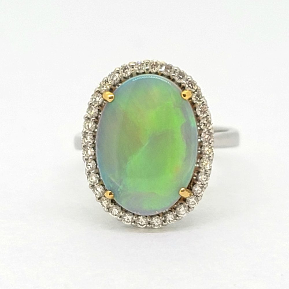 3.68ct Oval Cabochon Opal and Diamond Halo Cluster Ring