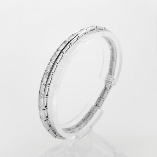 Graduated Baguette Cut Diamond Line Bracelet, 6.02 carat total, 18ct white gold links set with graduating baguette-cut diamonds
