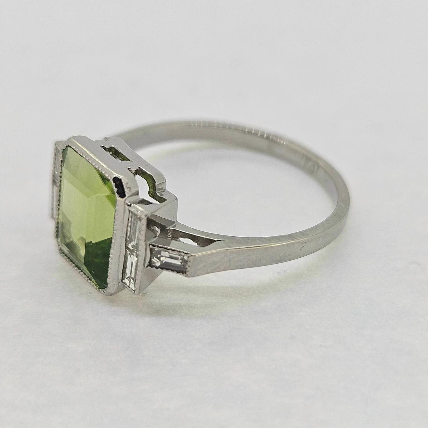 2.60ct Emerald Cut Peridot Ring with Baguette Diamonds in Platinum