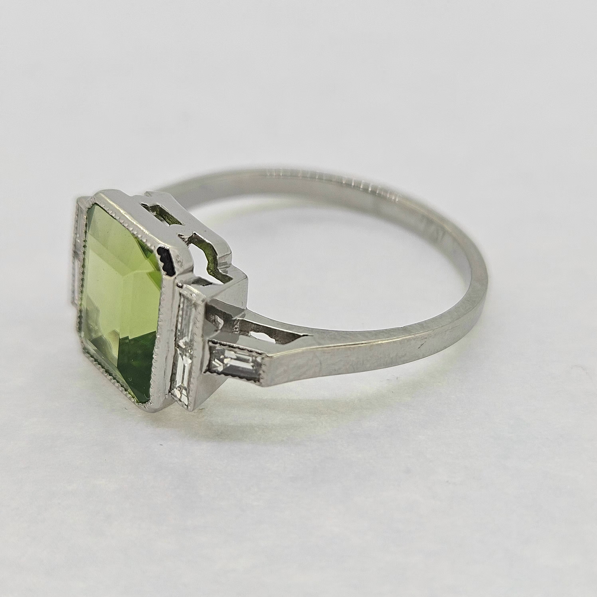 2.60ct Emerald Cut Peridot Ring with Baguette Diamonds in Platinum