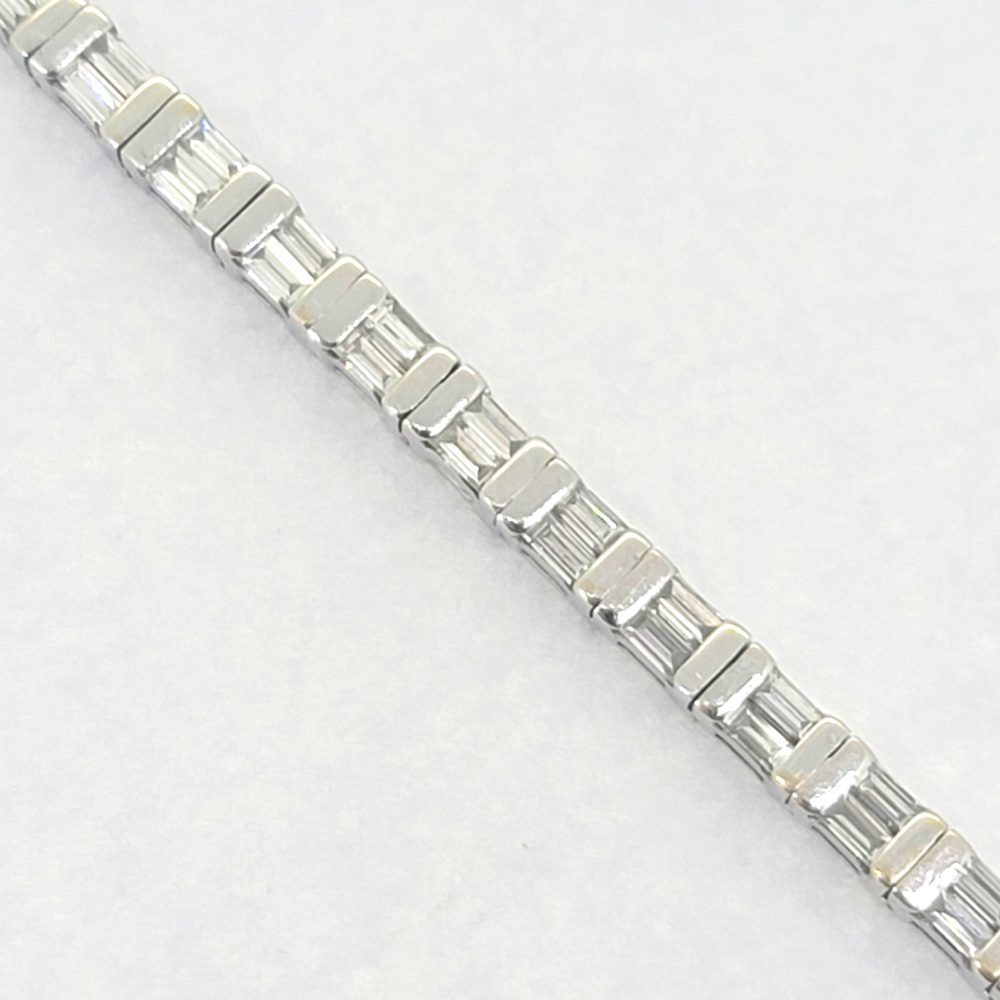 Vintage 4.50ct Baguette Cut Diamond Line Tennis Bracelet, 37 links each set with two baguette-cut diamonds in 18ct White Gold