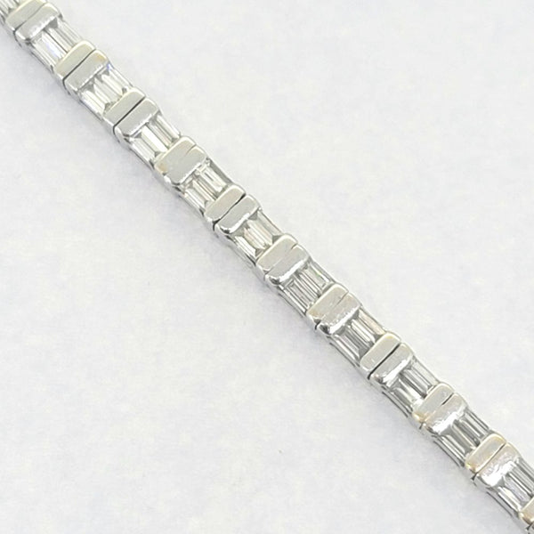 Vintage 4.50ct Baguette Cut Diamond Line Tennis Bracelet, 37 links each set with two baguette-cut diamonds in 18ct White Gold