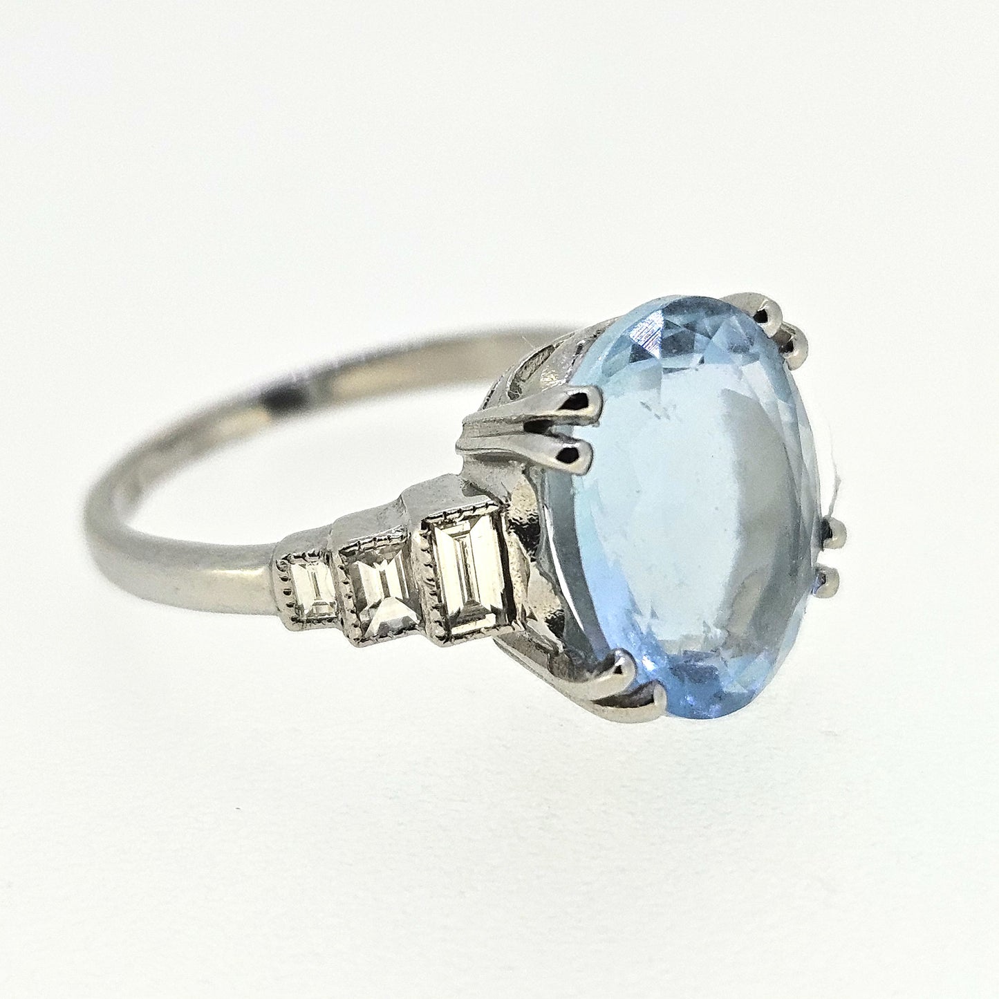 5ct Oval Aquamarine Solitaire Engagement Ring in Platinum with Baguette Diamond Shoulders