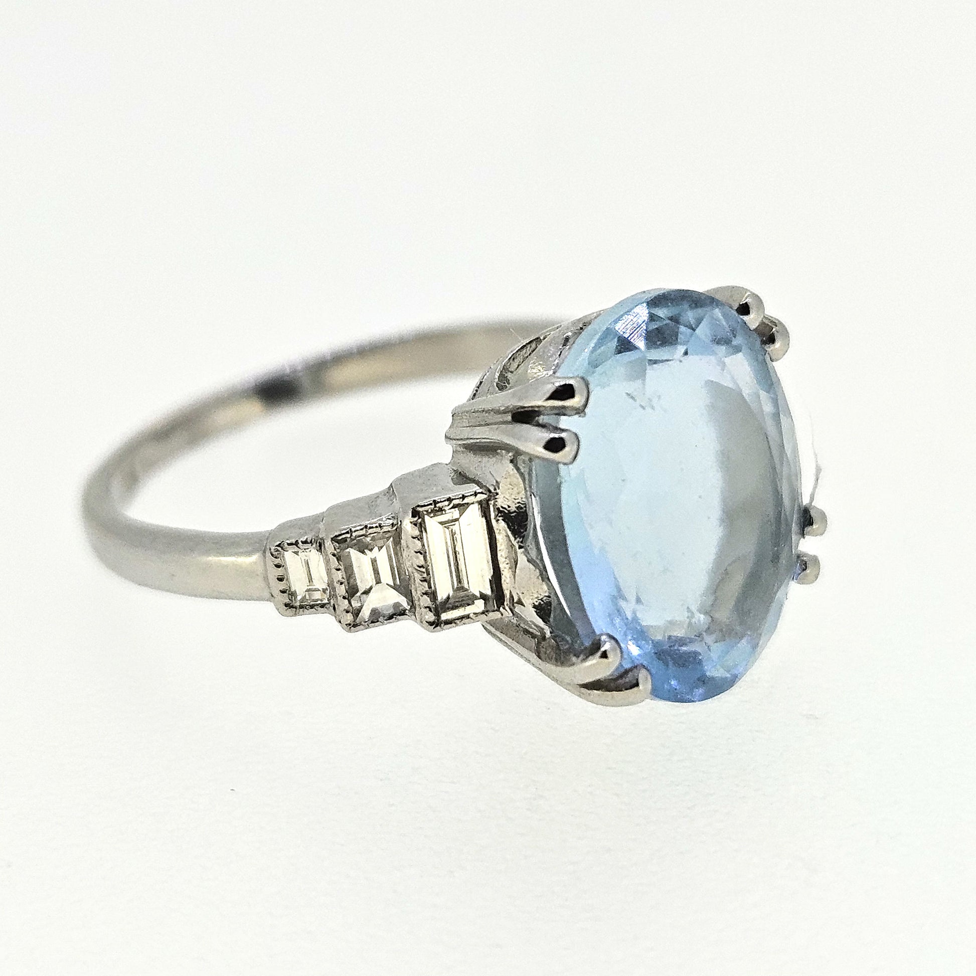 5ct Oval Aquamarine Solitaire Engagement Ring in Platinum with Baguette Diamond Shoulders