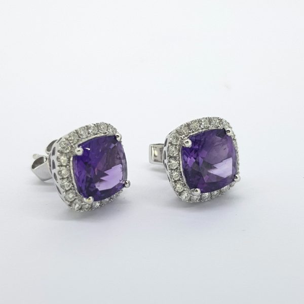 Amethyst and Diamond Cluster Stud Earrings; featuring 3.78cts square cushion amethysts surrounded by 0.54cts fine brilliant cut diamonds, in 18ct white gold