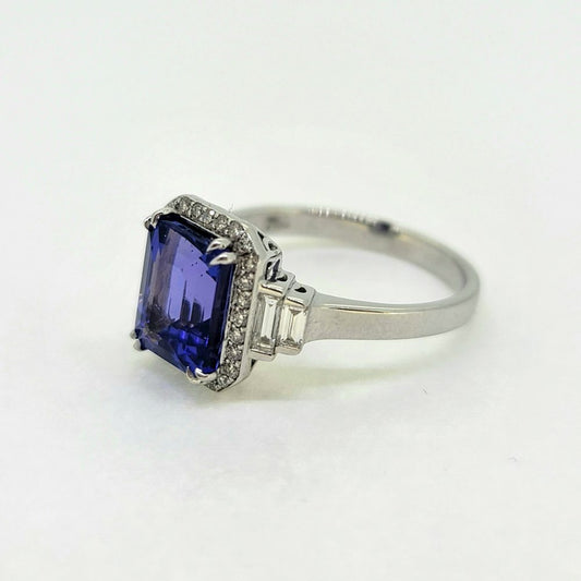 2ct Emerald Cut Tanzanite and Diamond Cluster Engagement Ring in Platinum with Baguette Diamond Shoulders