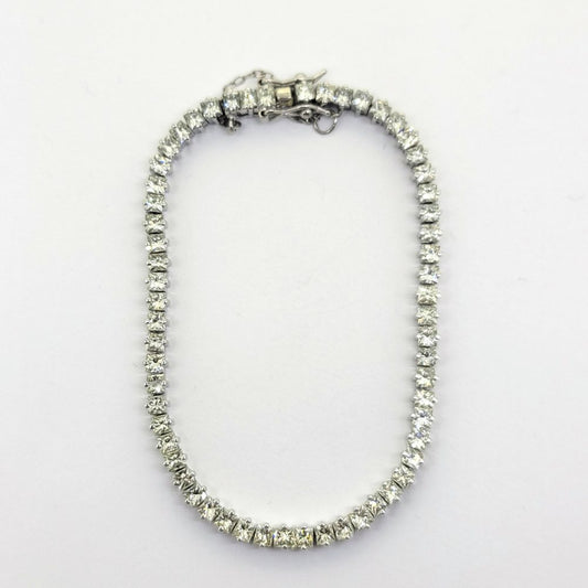 Princess Cut Diamond Line Tennis Bracelet, 8.18 carats of sparkling square princess-cut diamonds in 18ct white gold