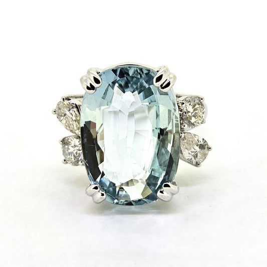9.95ct Aquamarine and Diamond Statement Cocktail Ring, 9.95ct oval aquamarine accented with sparkling diamonds to each side in 18ct white gold