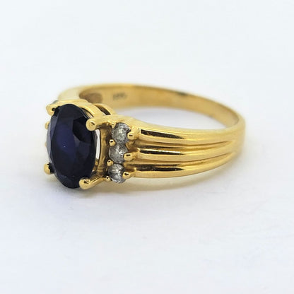 Oval Sapphire and Diamond Ring in 18ct Yellow Gold