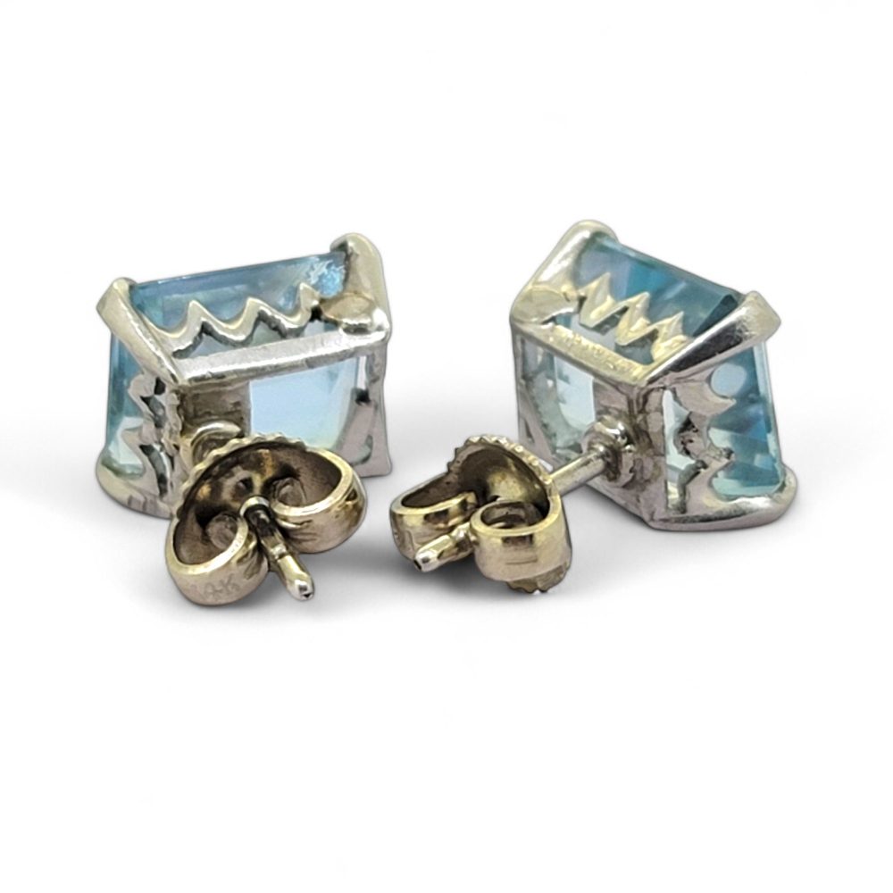 Aquamarine Stud Earrings in 18ct Gold, emerald-cut aquamarines claw set and mounted in 18ct white gold with post and butterfly fittings