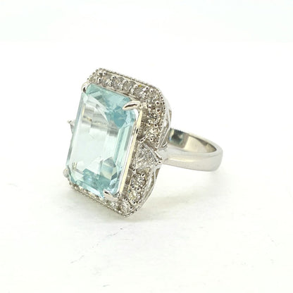 7.40ct Emerald Cut Aquamarine and Diamond Cluster Ring