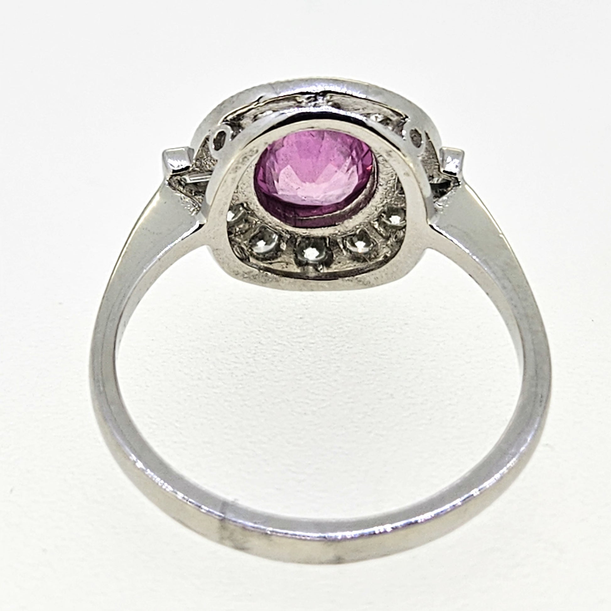 1.20ct oval pink sapphire ring with diamonds in platinum