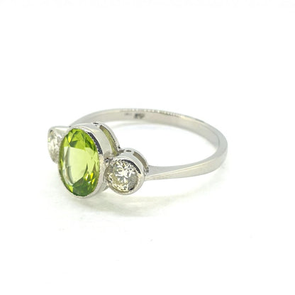 1.25ct Oval Peridot and Diamond Three Stone Ring