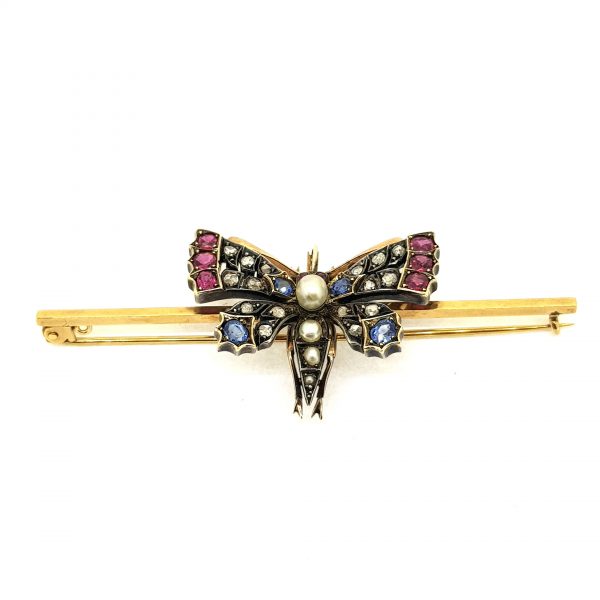 Antique Victorian Ruby Sapphire Diamond and Pearl Butterfly Brooch, set with rubies, sapphires and rose-cut diamonds in the wings and a body of pearls