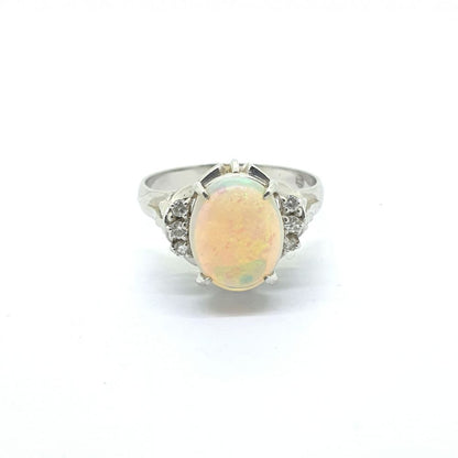1.61ct Oval Cabochon Opal and Diamond Ring