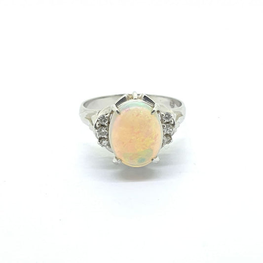 1.61ct Oval Cabochon Opal and Diamond Ring