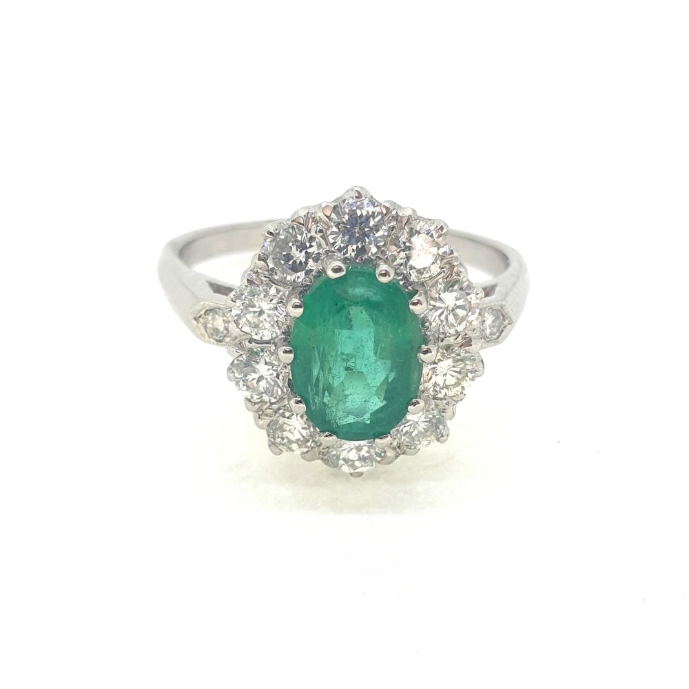 1.31ct Oval Emerald and Diamond Cluster Engagement Ring in Platinum