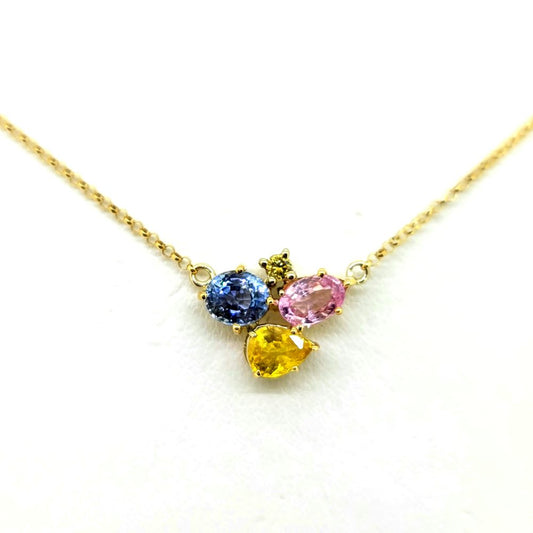 Multi Tri Colour Sapphire Pendant with Chain, pear cut and oval cut 0.74ct pink sapphire, 0.65ct yellow sapphire and blue sapphire with brilliant-cut diamond accents in 18ct yellow gold on fixed yellow gold trace chain