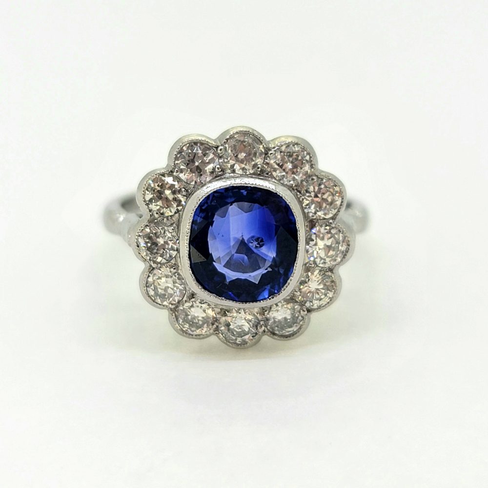 2.25ct Oval Sapphire and Diamond Floral Cluster Ring in Platinum