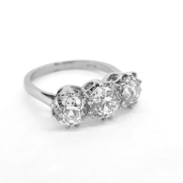 Old Cut Diamond Three Stone Ring in Platinum, 3.52 carat total, colour H, clarity SI1