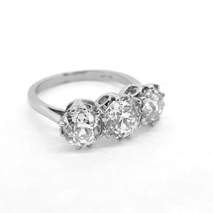 Old Cut Diamond Three Stone Ring in Platinum, 3.52 carat total, colour H, clarity SI1