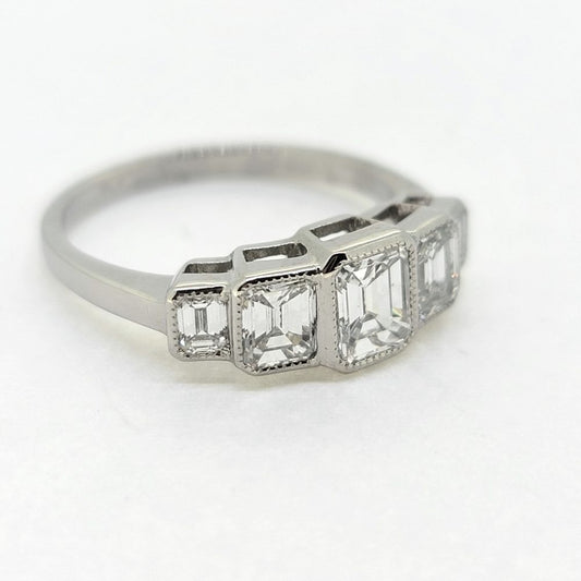 Emerald Cut Diamond Five Stone Engagement Ring in Platinum, 1.75 carats five graduating emerald cut diamonds in rub-over setting