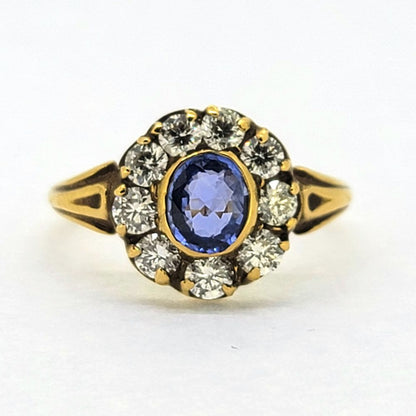 Antique Style 0.80ct Oval Sapphire and Diamond Cluster Engagement Ring in 18ct Yellow Gold