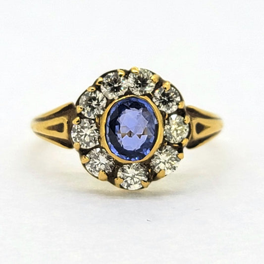 Antique Style 0.80ct Oval Sapphire and Diamond Cluster Engagement Ring in 18ct Yellow Gold