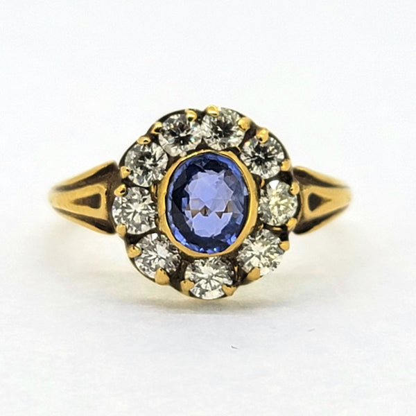 Antique Style 0.80ct Oval Sapphire and Diamond Cluster Engagement Ring in 18ct Yellow Gold