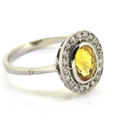 1.90ct Oval Yellow Sapphire and Diamond Halo Cluster Engagement Ring in Platinum