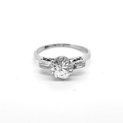 Diamond Solitaire Engagement Ring with Baguette Cut Diamond Shoulders