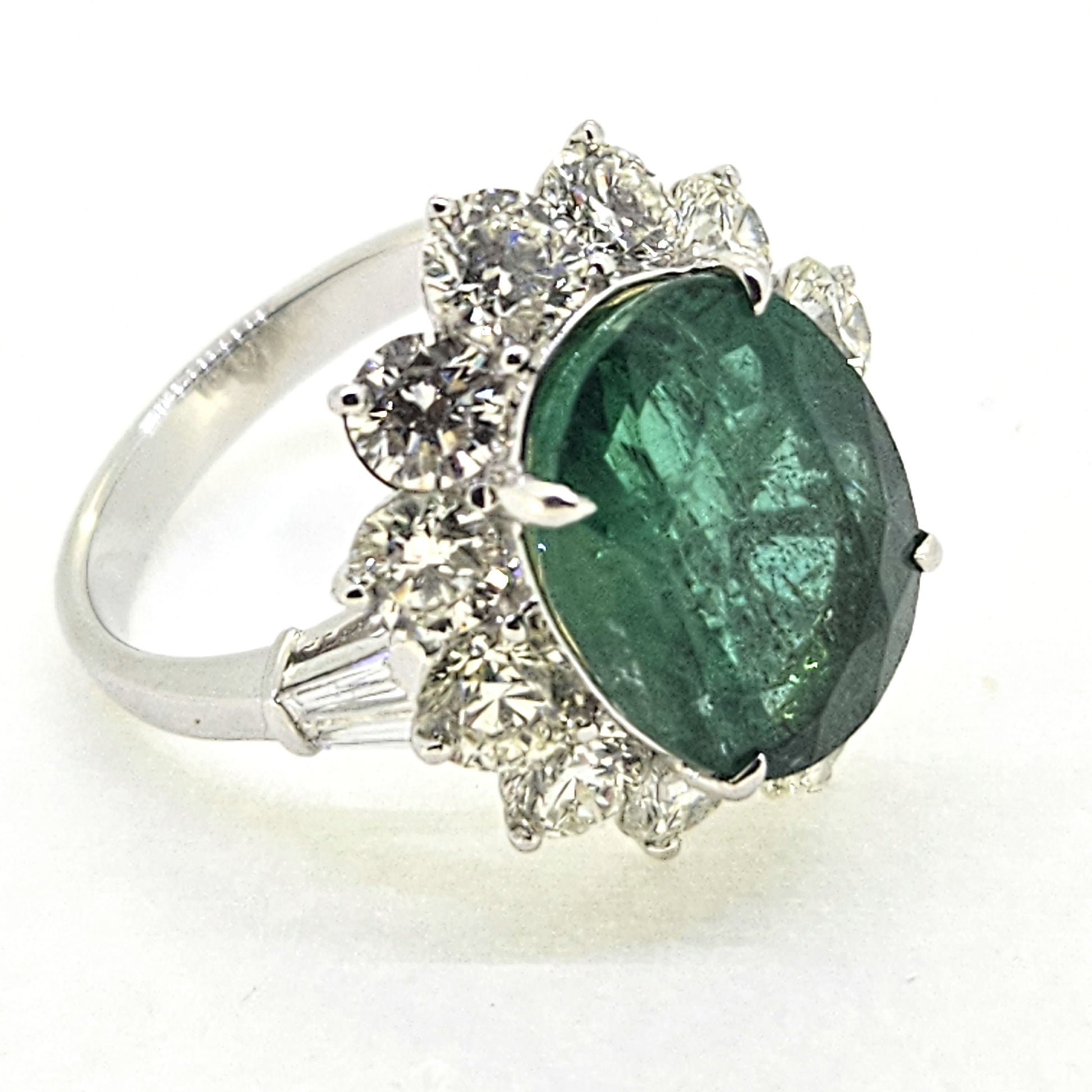 6.61ct Oval Emerald and Diamond Cluster Engagement Ring in 18ct Gold