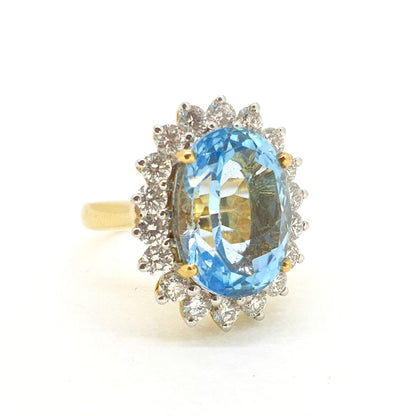 14.28ct Oval Blue Topaz and Diamond Cluster Dress Ring