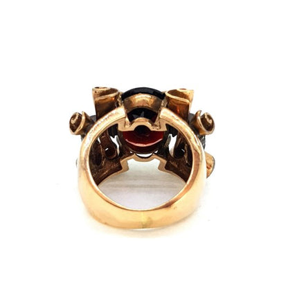 Antique Garnet and Gold Dress Ring with Scroll Shoulders