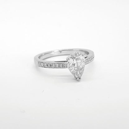 Pear Shaped Diamond Cluster Engagement Ring; central 1.08ct pear-cut diamond within a diamond surround, accented with diamond set shoulders, in 18ct white gold