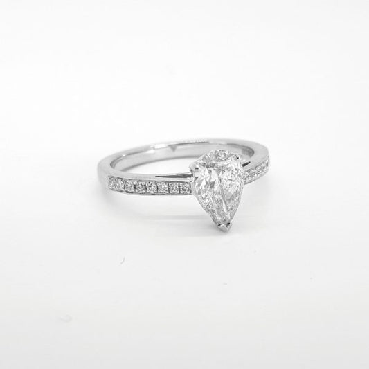 Pear Shaped Diamond Cluster Engagement Ring; central 1.08ct pear-cut diamond within a diamond surround, accented with diamond set shoulders, in 18ct white gold