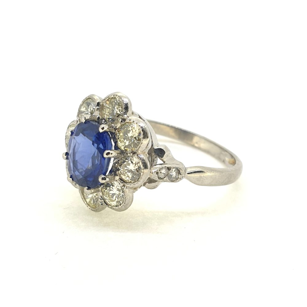 1.90ct Oval Sapphire and Diamond Cluster Engagement Ring in Platinum