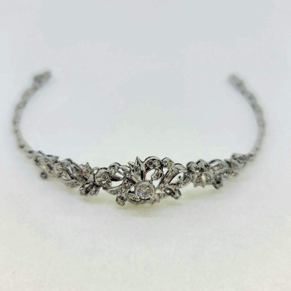 1ct Diamond Floral Bracelet in 18ct White Gold, elegant diamond bracelet composed of 18ct white gold floral scroll design studded with diamonds