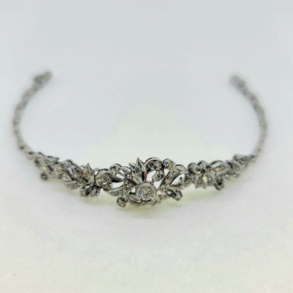 1ct Diamond Floral Bracelet in 18ct White Gold, elegant diamond bracelet composed of 18ct white gold floral scroll design studded with diamonds