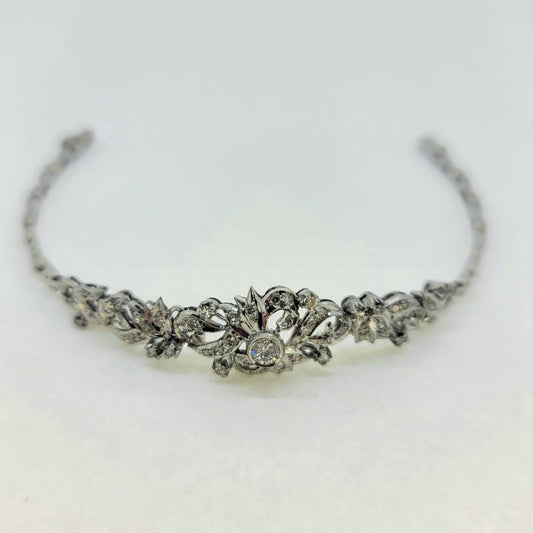 1ct Diamond Floral Bracelet in 18ct White Gold, elegant diamond bracelet composed of 18ct white gold floral scroll design studded with diamonds