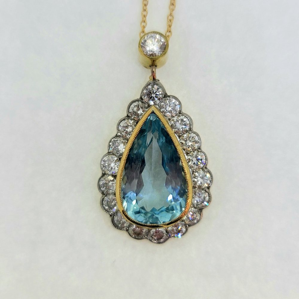 4.75ct Pear Cut Aquamarine and Diamond Cluster Pendant