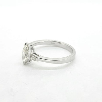 0.57ct Marquise Cut Diamond Ring with Tapered Baguette Shoulders