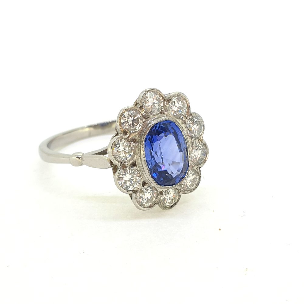 1.85ct Oval Sapphire and Diamond Cluster Engagement Ring in Platinum