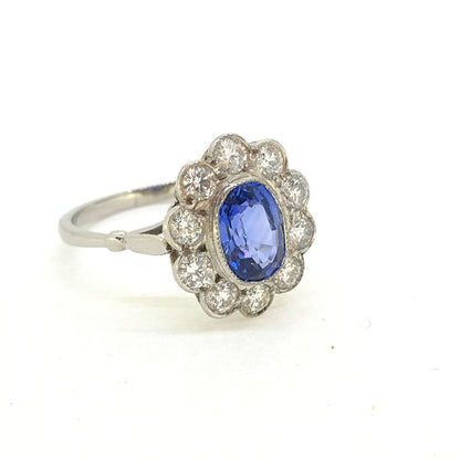 1.85ct Oval Sapphire and Diamond Cluster Engagement Ring in Platinum